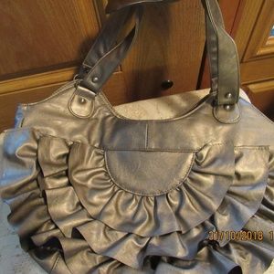 JB568.  Unique Gold Colored Purse